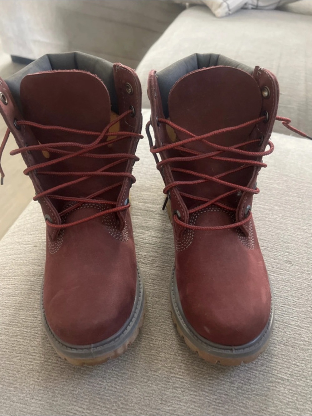 Size 5w Timberland 6-inch lace-up boots, in a burgundy/wine-colored nubuck leat